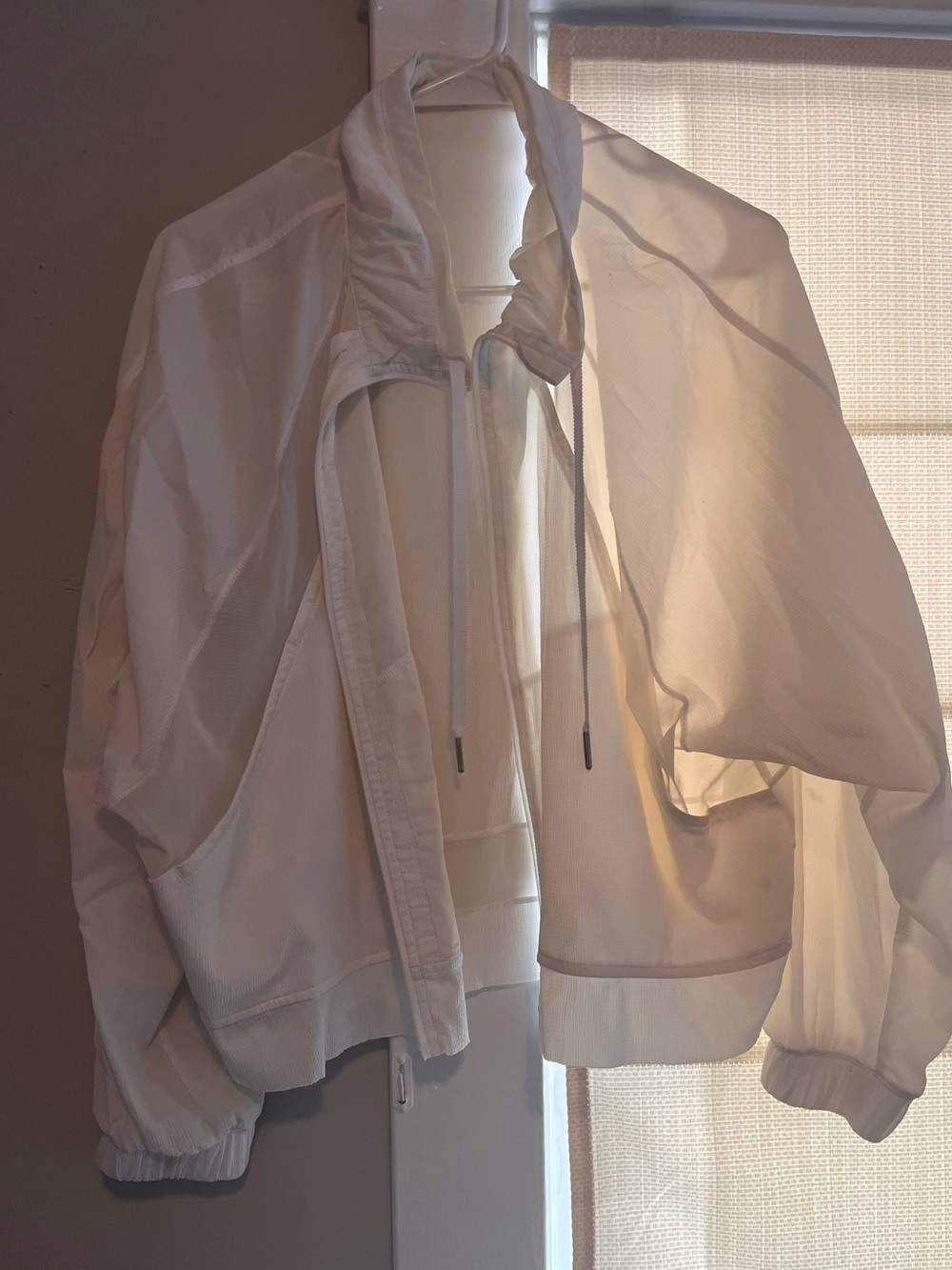White sheer panel lululemon windbreaker